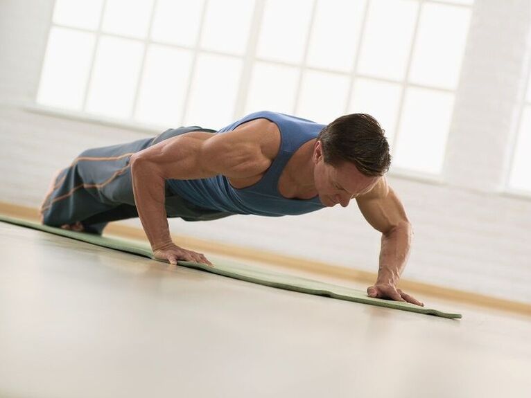 The man performs physical exercises to prevent erectile dysfunction